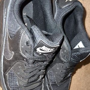 Mens Nike Air. Size 8 1/2. Worn quite a bit. But still in pretty good shape.